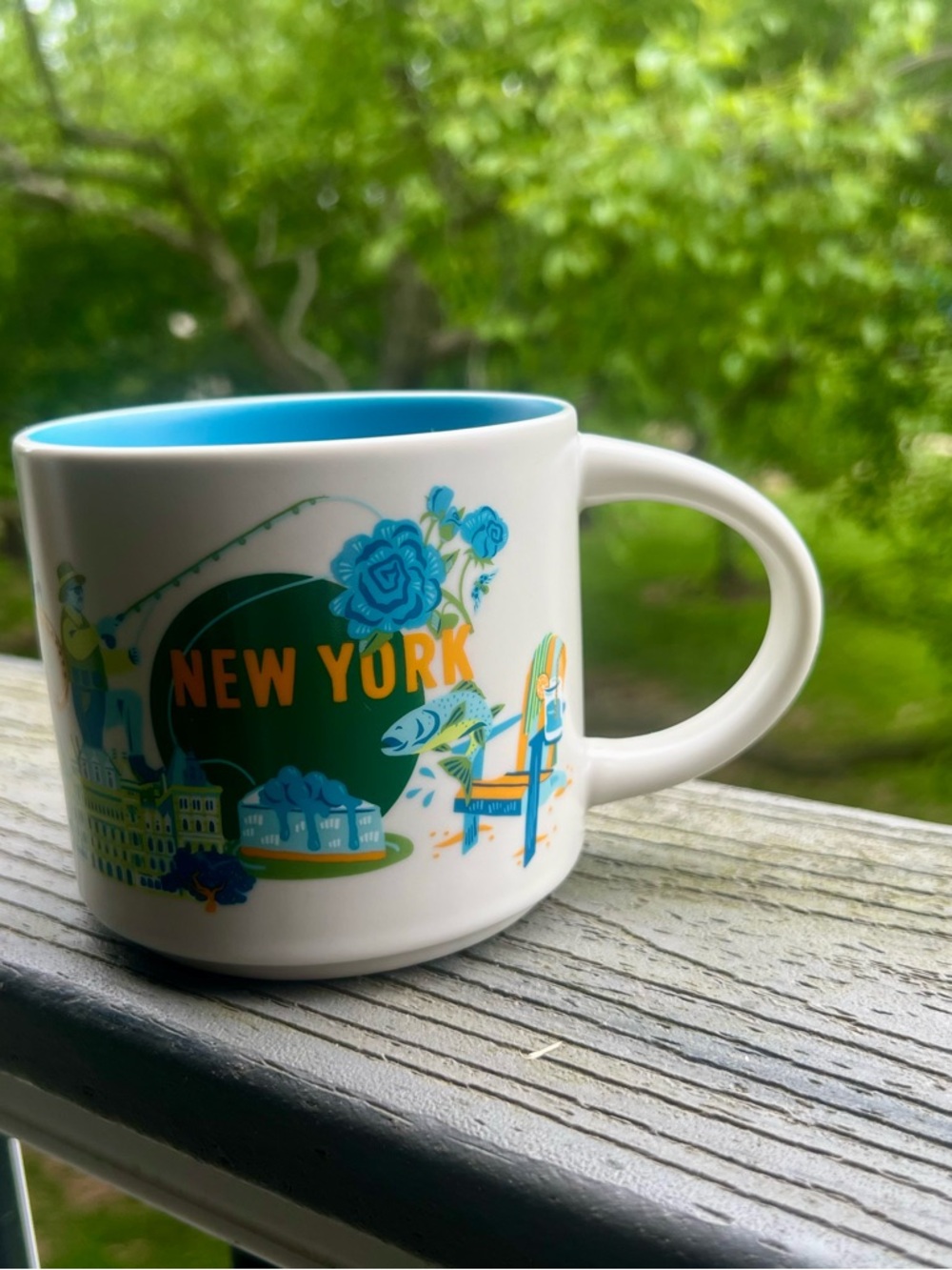 Starbucks White Mug with Turquoise Interior and Multicolor New York Design
